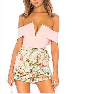 Aaliyah Deep V blush bodysuit by the way.